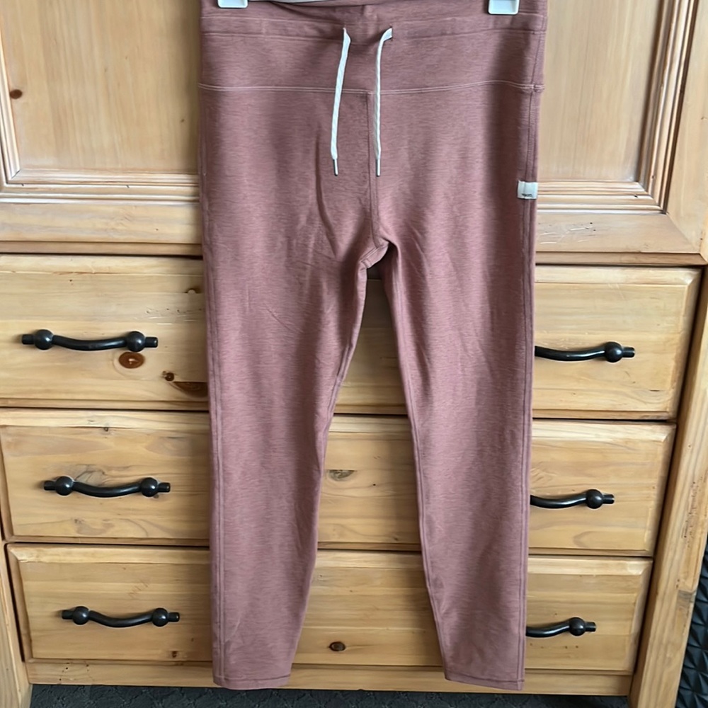 Peach/mauve colored leggings